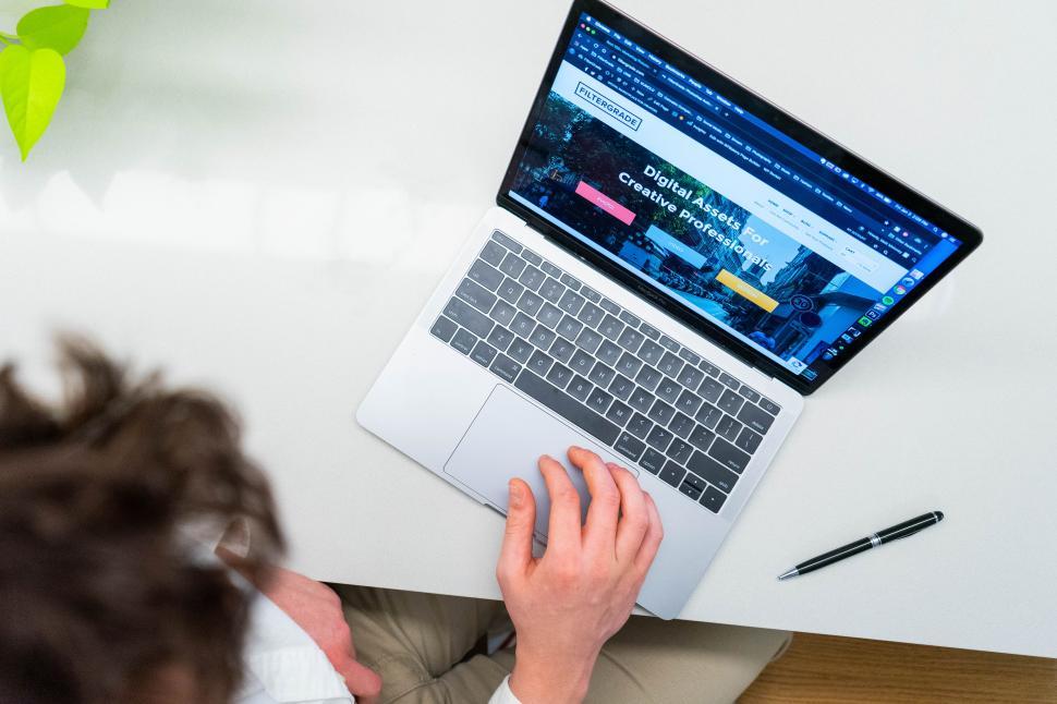 working-on-laptop-with-online-webpage